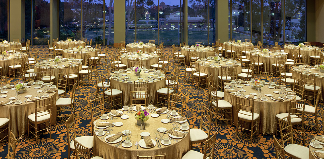 Table and chairs setup in the Palisades Room at UCLA Carnesale Commons